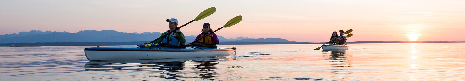 People kayaking in Olympia Bay.