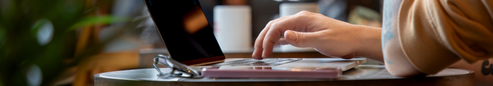 Person using their laptop to bank.