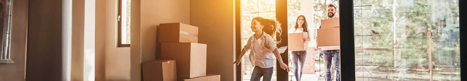 Family moving into their new home.