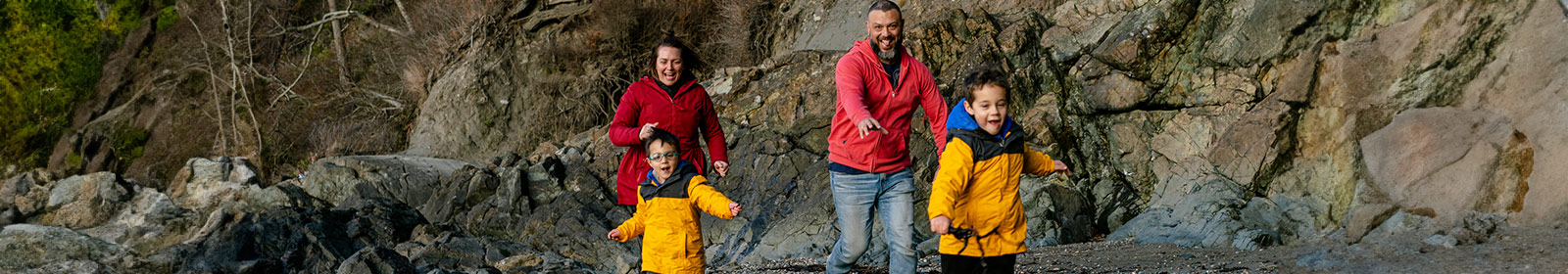 Family taking a coastal hike.