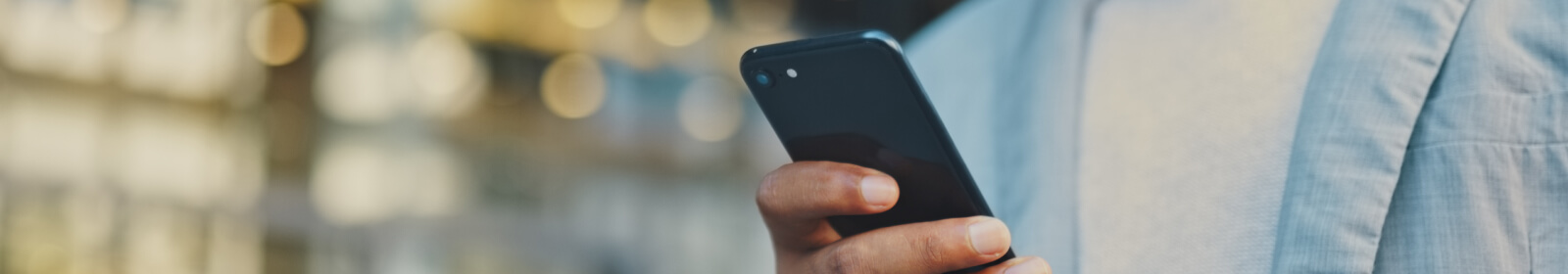 Person using their phone to bank.